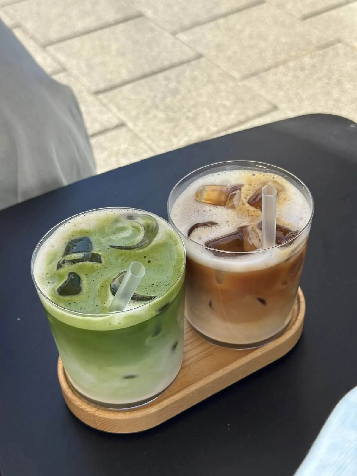Iced matcha and coffee served side by side at Daily Moka